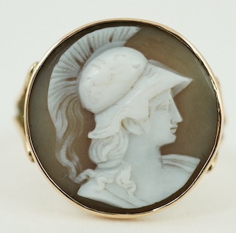 An 18ct and camel shell set ring, carved with the bust of a soldier to sinister, size M/N, gross weight 3.5 grams. Condition - fair